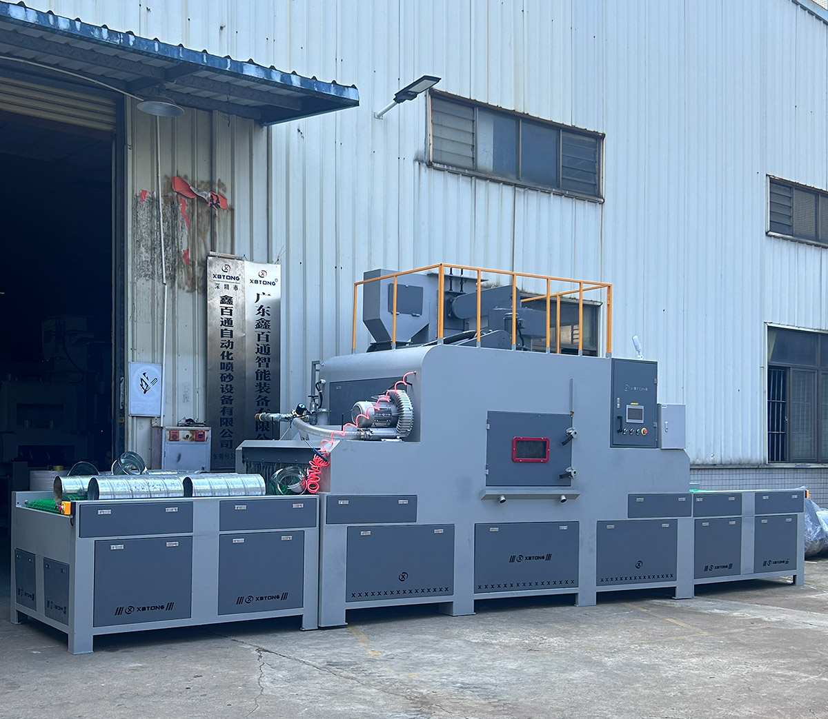 深圳百超機(jī)械輸送式自動噴砂機(jī)